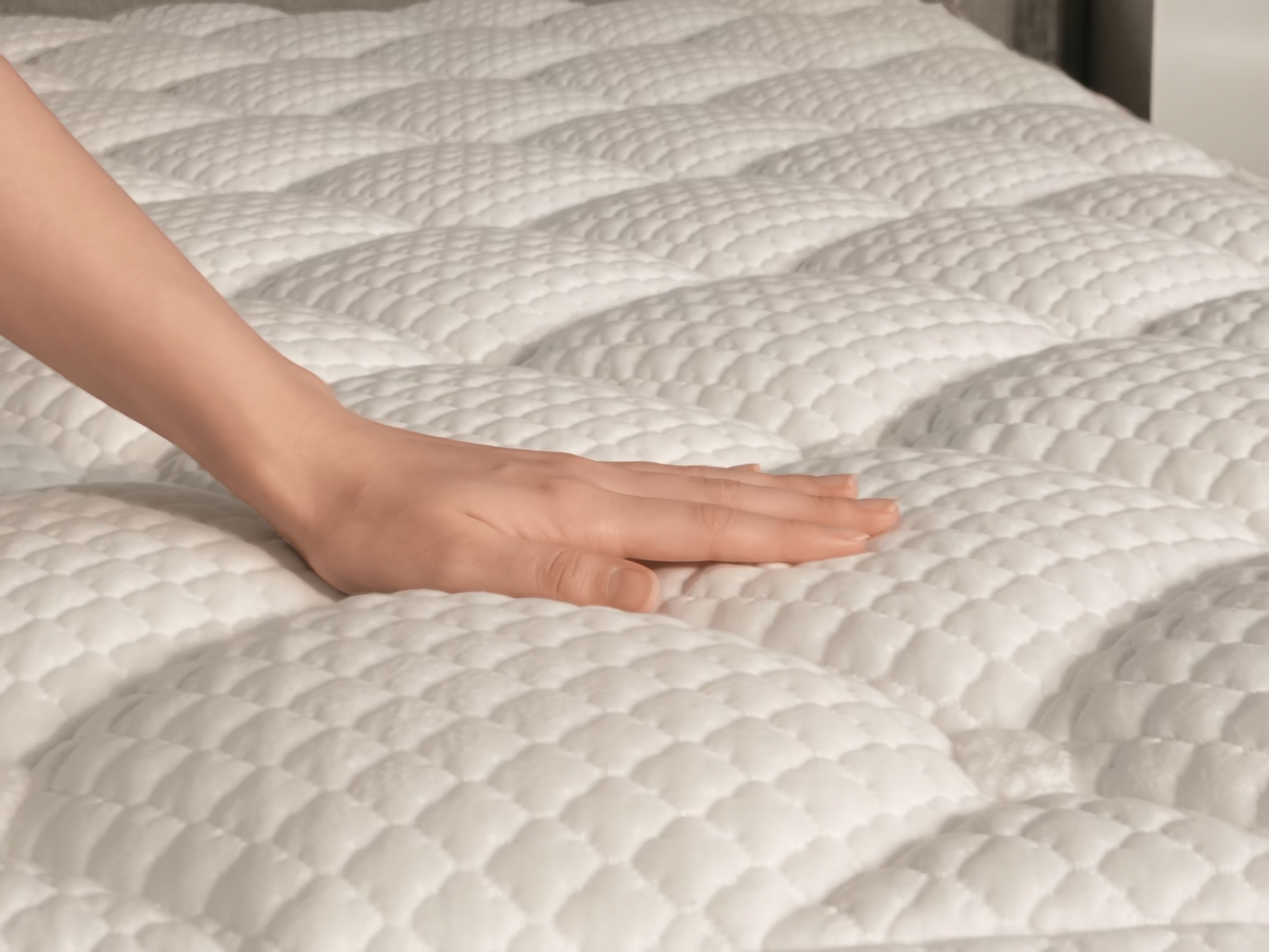 Close-up of the Puffy Legacy hand-tufted TENCEL and silk cover